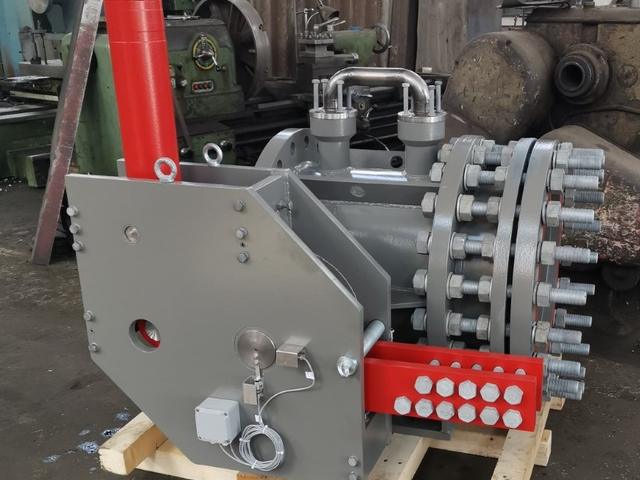 Turbine inlet butterfly valve with integrated bypass and dismantling joint