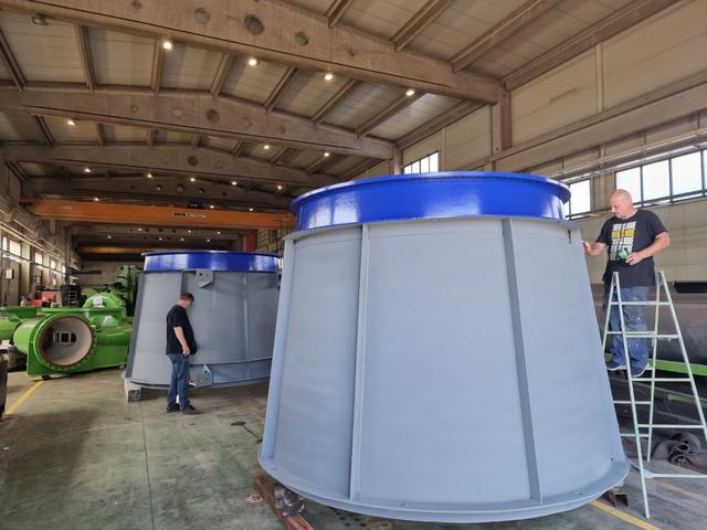 Draft tube cones during coating