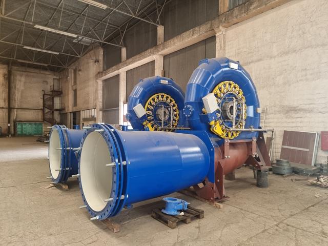 Two Francis turbines with guide vane mechanism in final assembly